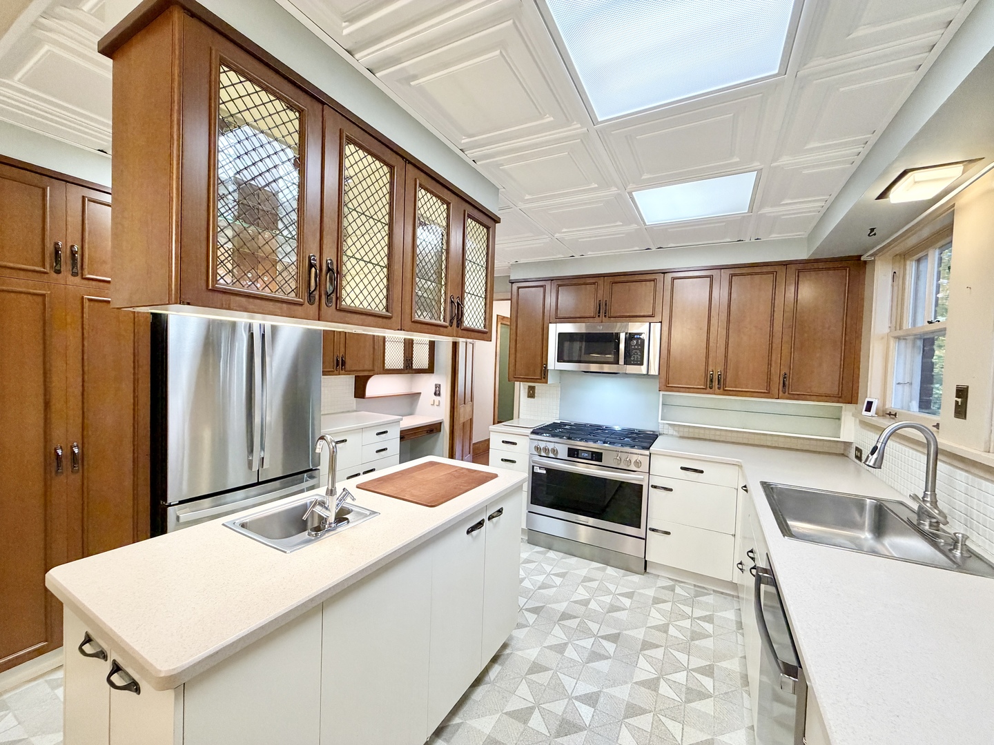 841 Douglas Avenue Elgin, IL 60120 - Photo 29 of 75 a large kitchen with stainless steel appliances granite countertop a sink stove and refrigerator
