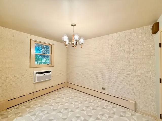 a bathroom with a bathtub and a sink