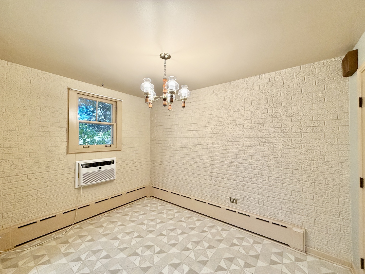 841 Douglas Avenue Elgin, IL 60120 - Photo 31 of 75 a view of a livingroom with a chandelier
