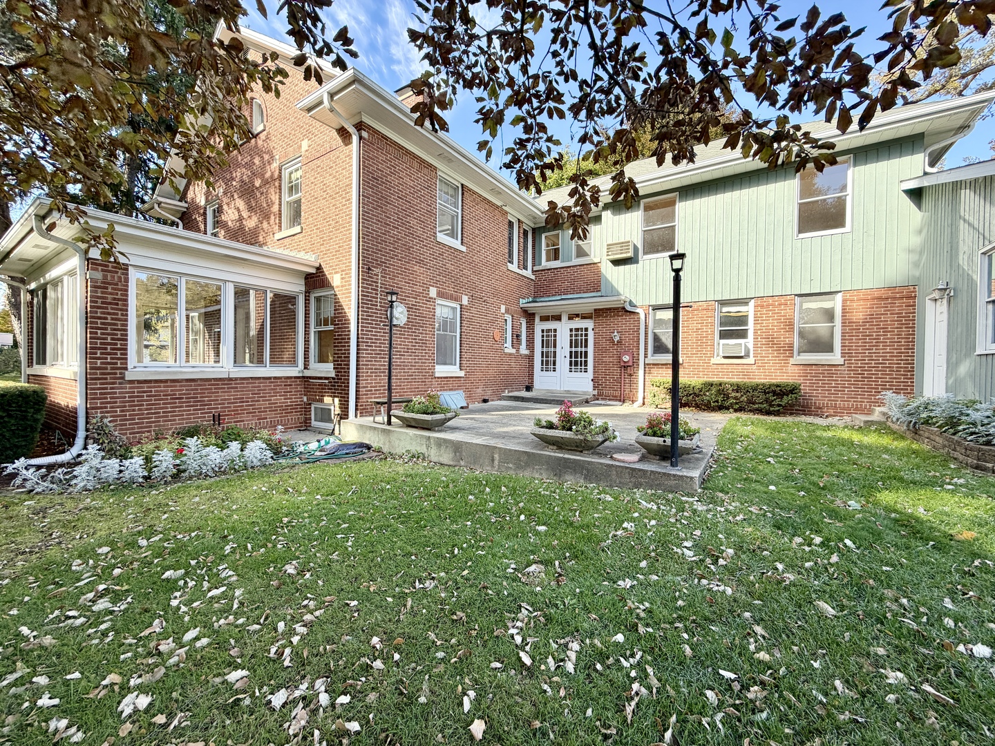 841 Douglas Avenue Elgin, IL 60120 - Photo 4 of 75 a view of a house with a backyard