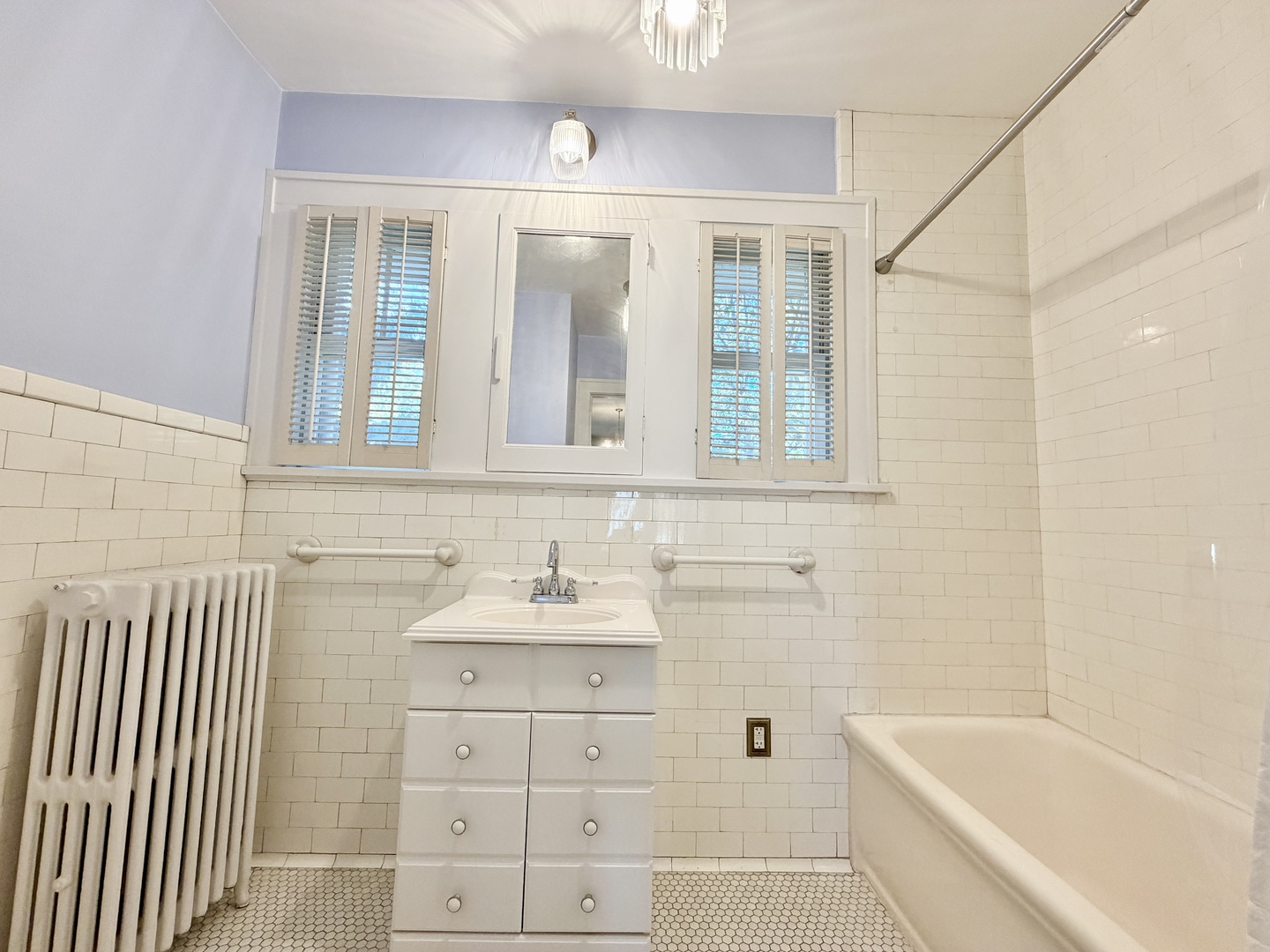 841 Douglas Avenue Elgin, IL 60120 - Photo 46 of 75 a bathroom with a sink and a bathtub