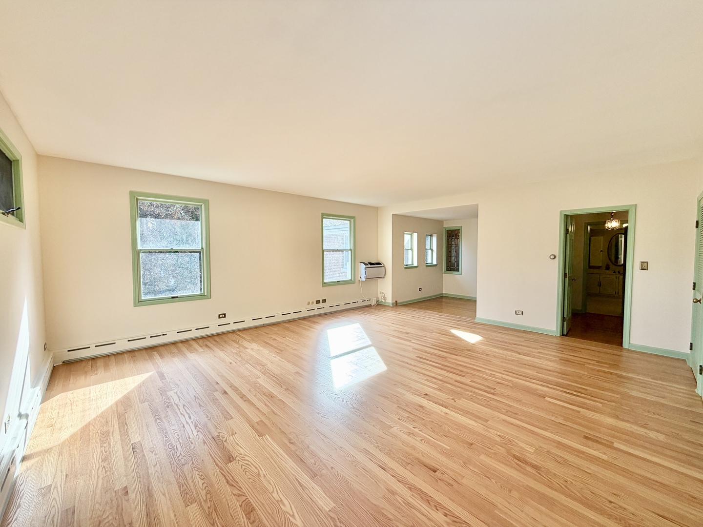 841 Douglas Avenue Elgin, IL 60120 - Photo 49 of 75 an empty room with wooden floor and windows
