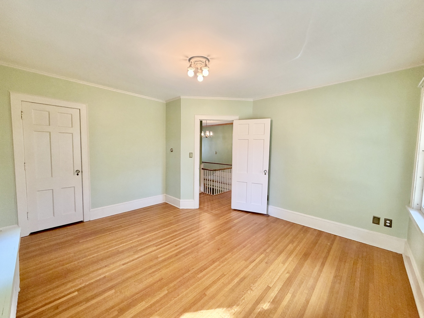 841 Douglas Avenue Elgin, IL 60120 - Photo 56 of 75 a view of an empty room with wooden floor
