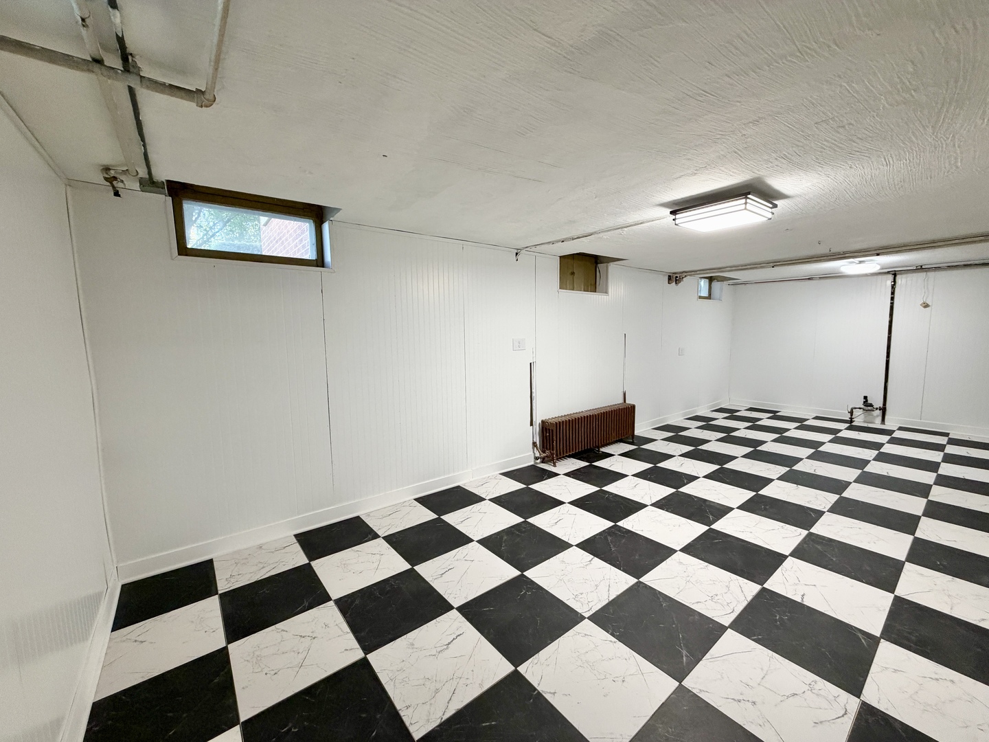 841 Douglas Avenue Elgin, IL 60120 - Photo 66 of 75 a black and white checkered floor with a black white checkered floor