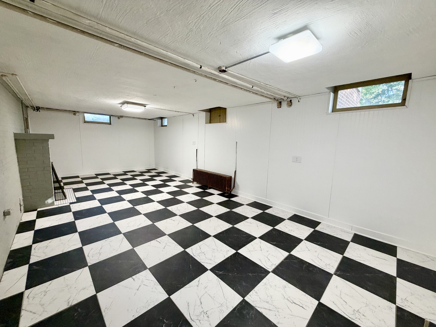 841 Douglas Avenue Elgin, IL 60120 - Photo 68 of 75 a black and white checkered floor with a black white checkered floor