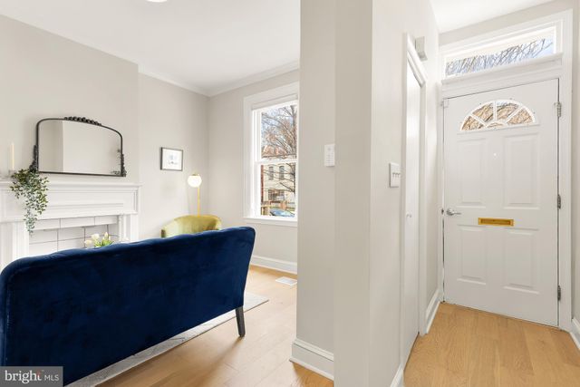 a room with a sink and a mirror