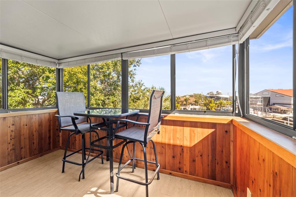 2385 Hanover Drive Dunedin, FL 34698 - Photo 22 of 87 a view of a dining room with furniture and window
