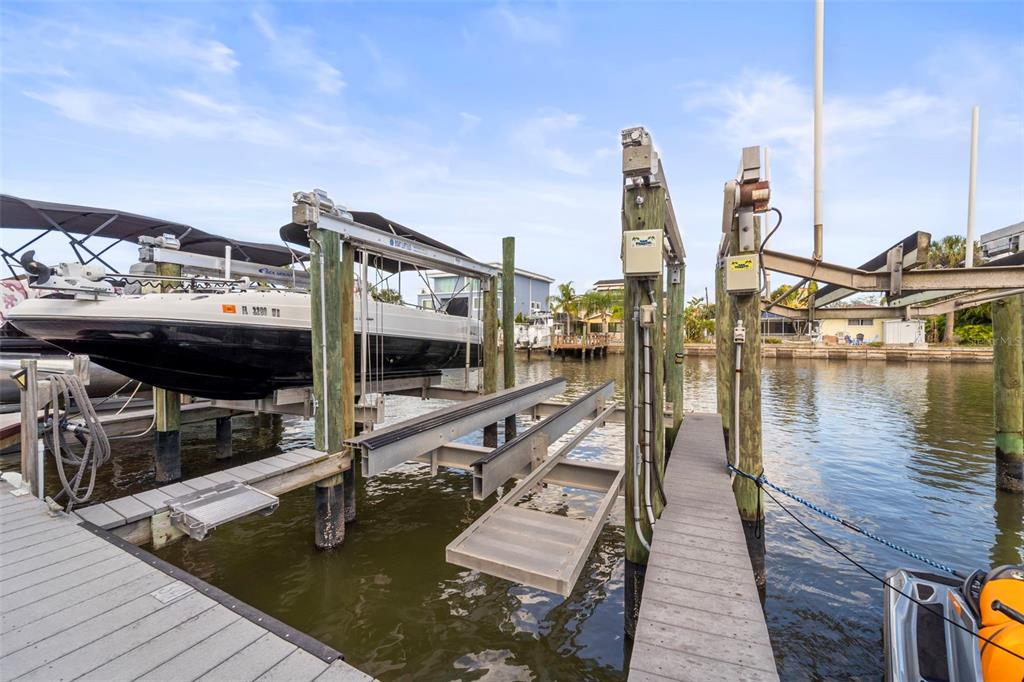 2385 Hanover Drive Dunedin, FL 34698 - Photo 70 of 87 a view of a house with a ocean view