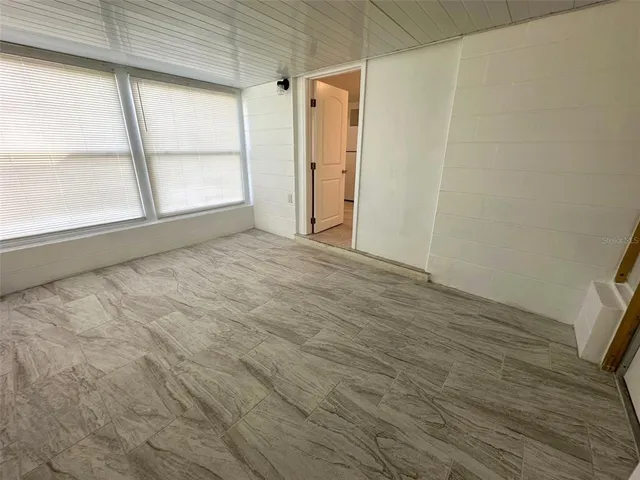 a view of a room with an empty space