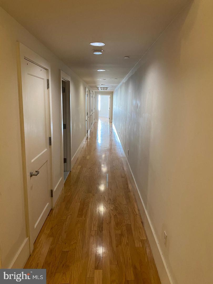 1615 Walnut Street, Unit 3 Philadelphia, PA 19102 - Photo 9 of 15 Hallway to Bedrooms, Storage & Laundry closets