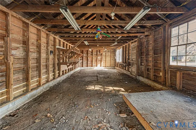 a view of a room with wooden walls
