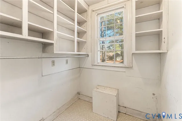 a view of an empty walk in closet