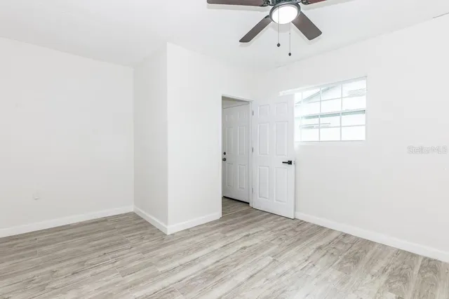 a view of entryway with wooden floor
