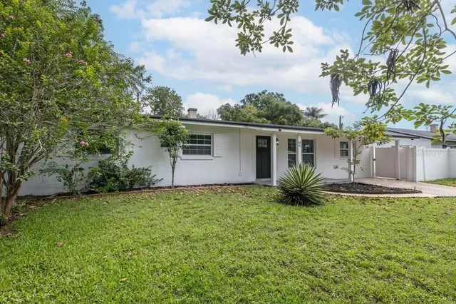 front view of a house with a yard