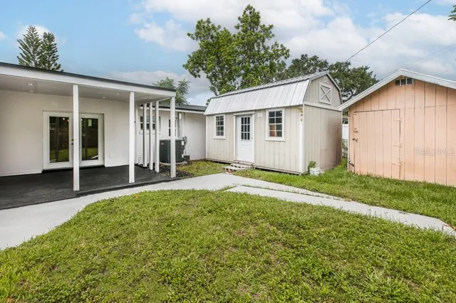a house view with a outdoor space