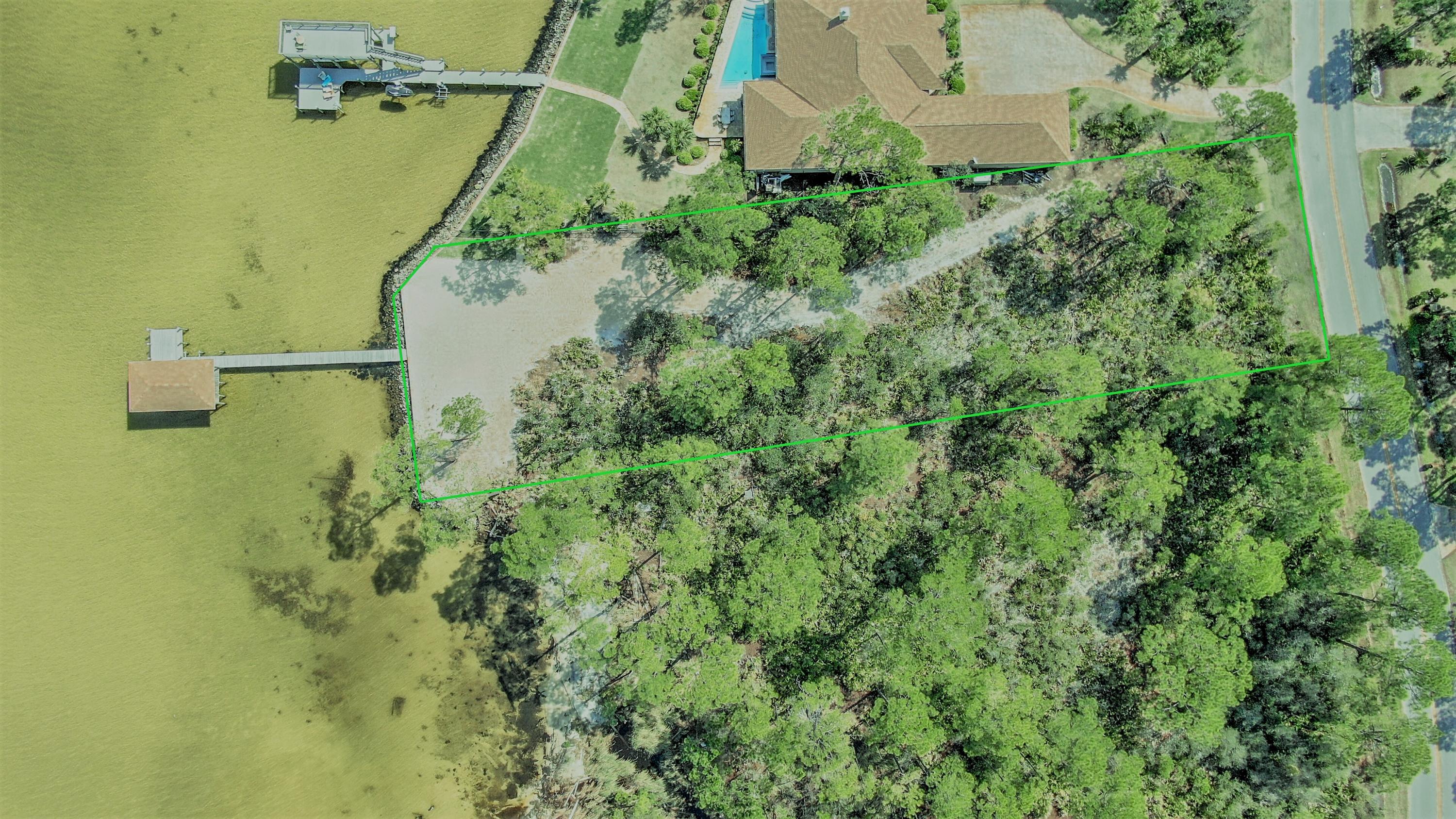 1339 Driftwood Point Road, Unit J2 Santa Rosa Beach, FL 32459 - Photo 16 of 26 an aerial view of a house with a yard