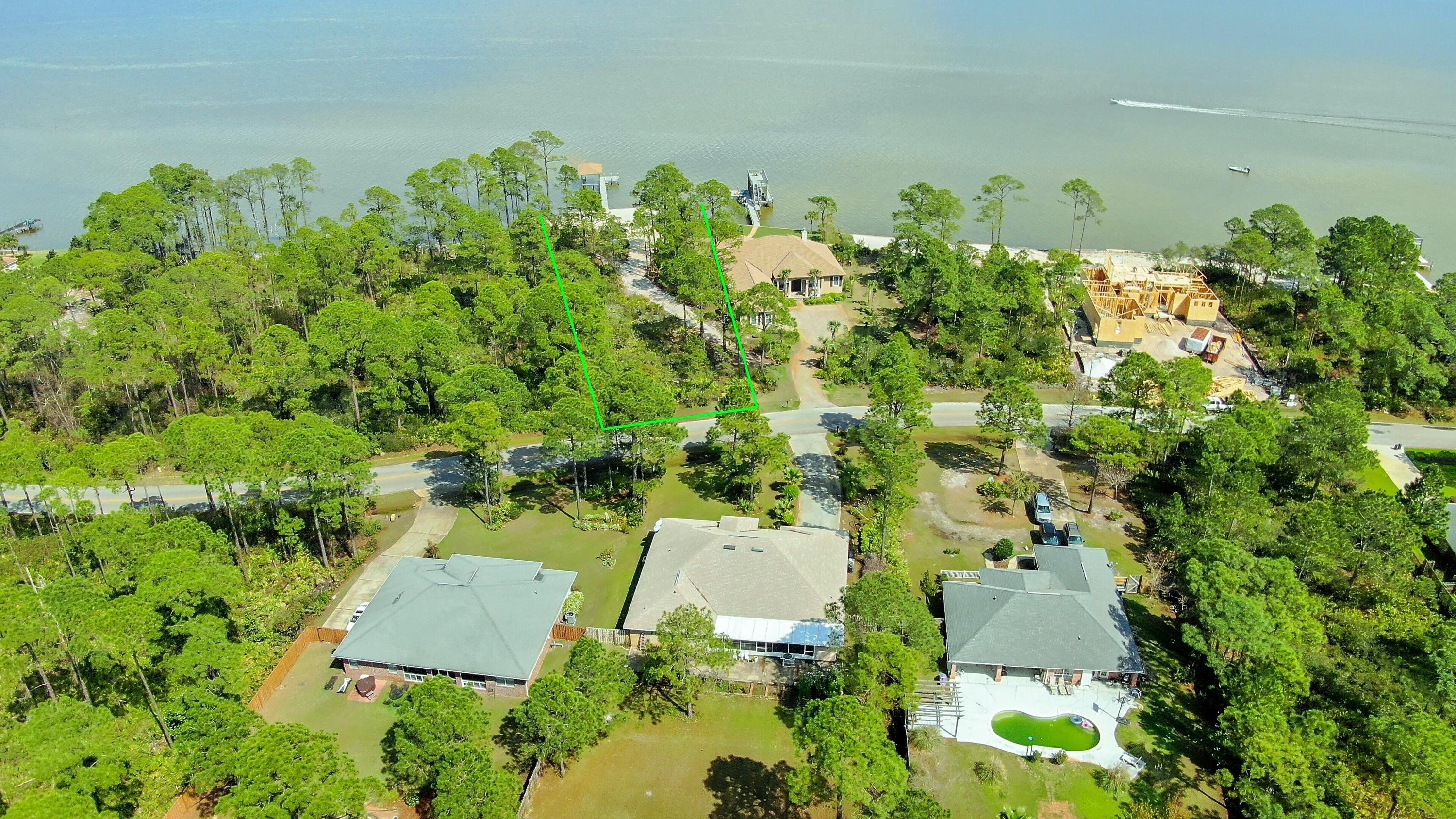 1339 Driftwood Point Road, Unit J2 Santa Rosa Beach, FL 32459 - Photo 10 of 26 an aerial view of a house with a yard