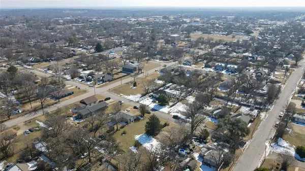 an aerial view of a city with lots of residential buildings