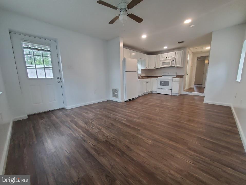 5 2nd Avenue Pemberton, NJ 08068 - Photo 3 of 11 a view of kitchen with cabinets and wooden floor