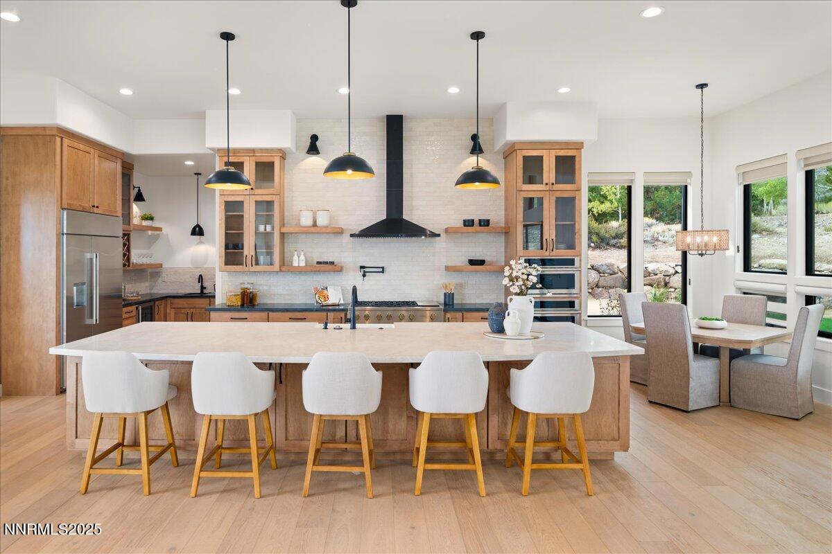 10755 Renegade Court Reno, NV 89511 - Photo 12 of 60 a large kitchen with a table and chairs