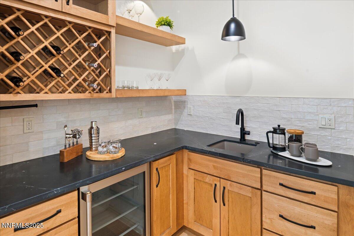 10755 Renegade Court Reno, NV 89511 - Photo 18 of 60 a kitchen with a sink and cabinets