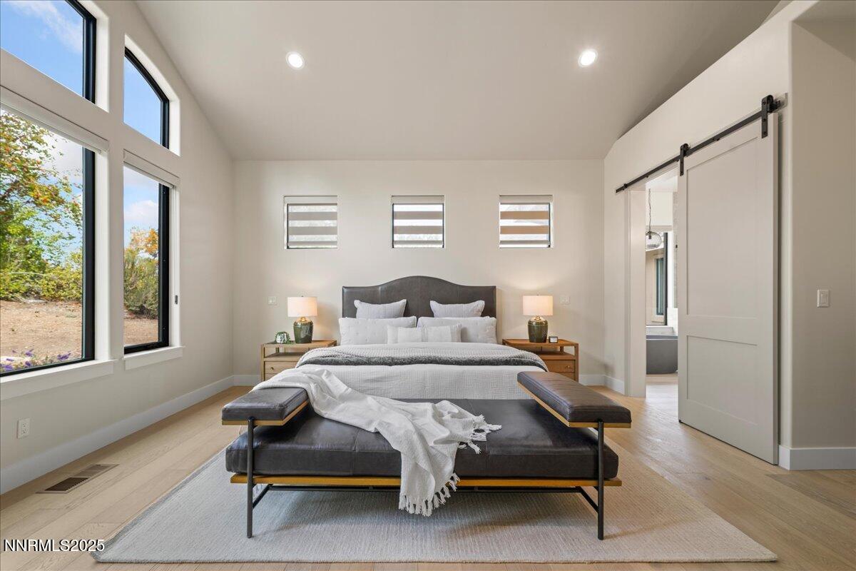 10755 Renegade Court Reno, NV 89511 - Photo 28 of 60 a bedroom with furniture and a window