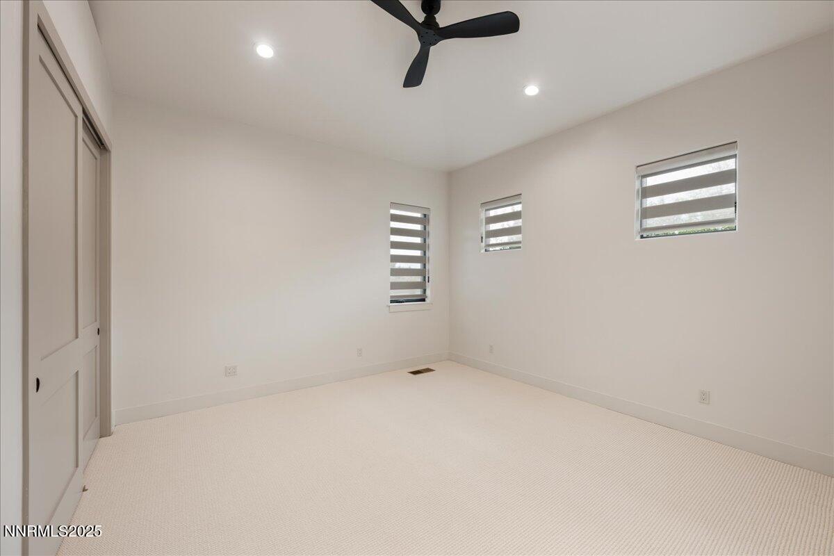 10755 Renegade Court Reno, NV 89511 - Photo 36 of 60 an empty room with windows