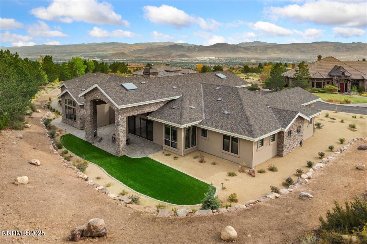 10755 Renegade Court Reno, NV 89511 - Photo 52 of 60 an aerial view of a house with a yard