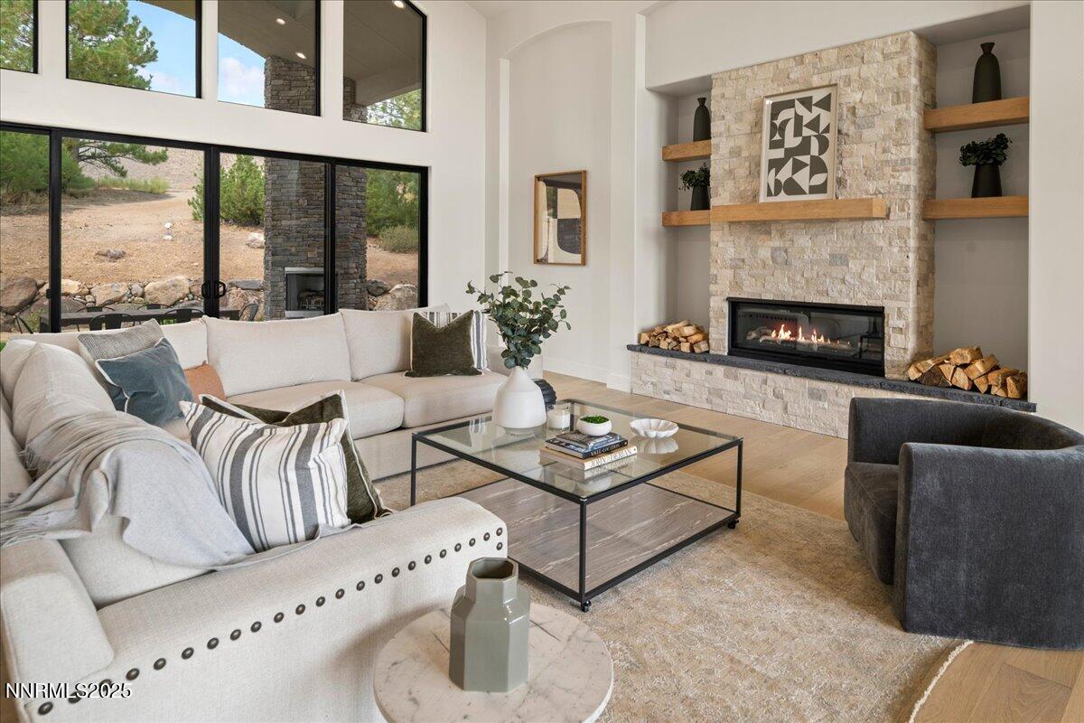 10755 Renegade Court Reno, NV 89511 - Photo 8 of 60 a living room with furniture and a fireplace