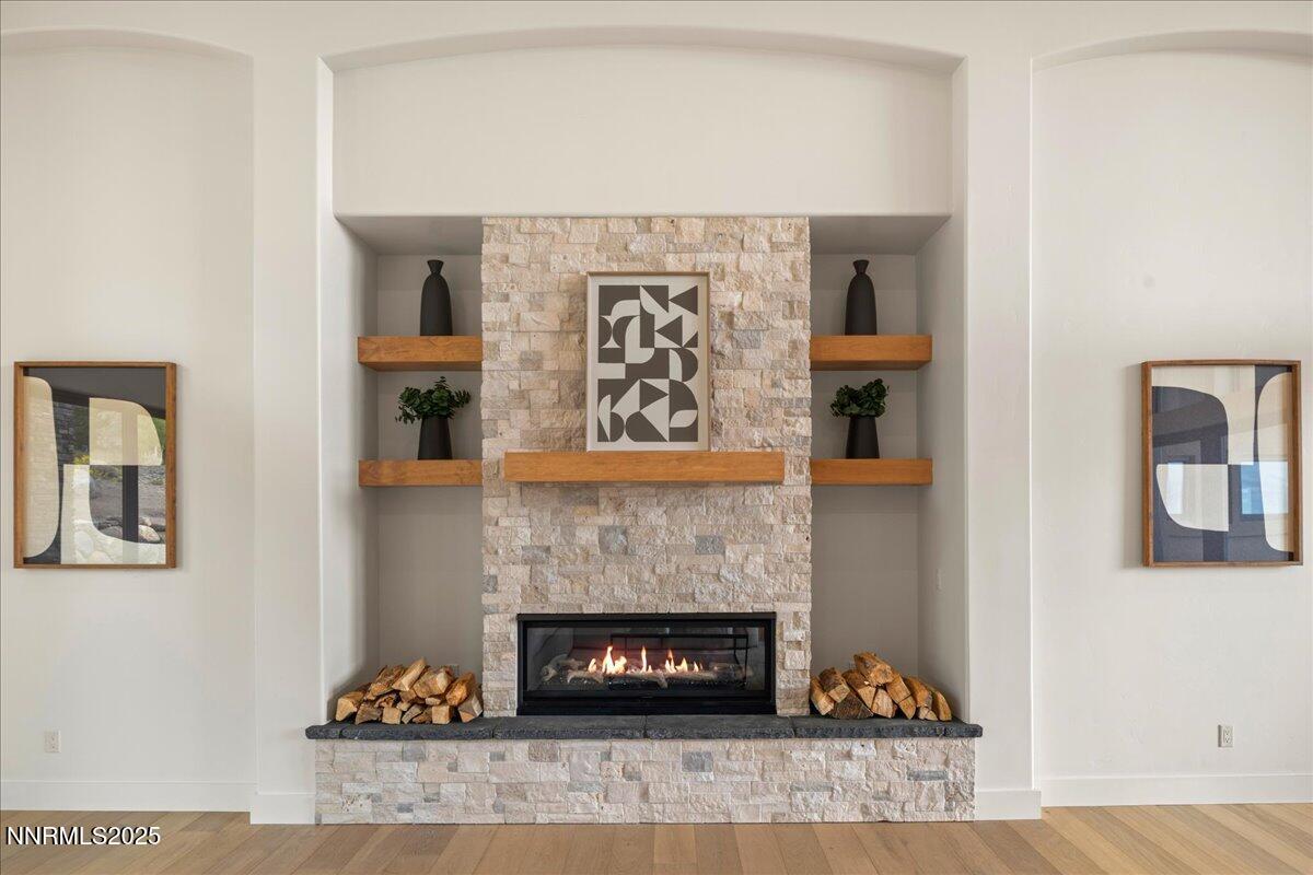 10755 Renegade Court Reno, NV 89511 - Photo 9 of 60 a living room with furniture and a fireplace