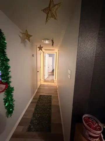 a bedroom with a bed and a ceiling fan