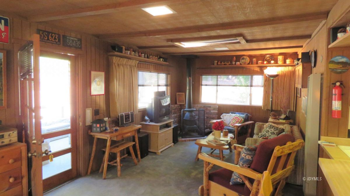 0 Lodge Road Idyllwild, CA 92549 - Photo 3 of 14 a living room with furniture and a large window