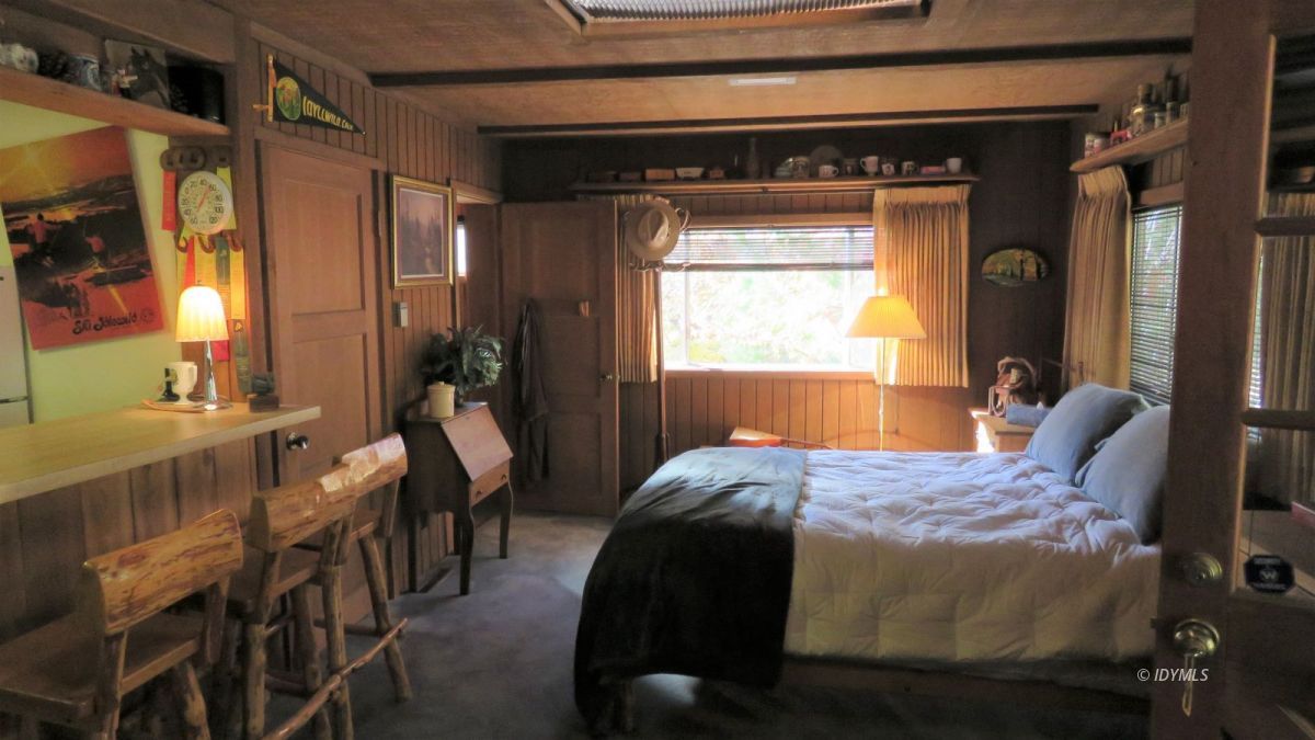 0 Lodge Road Idyllwild, CA 92549 - Photo 5 of 14 a bed sitting in a bedroom next to a window