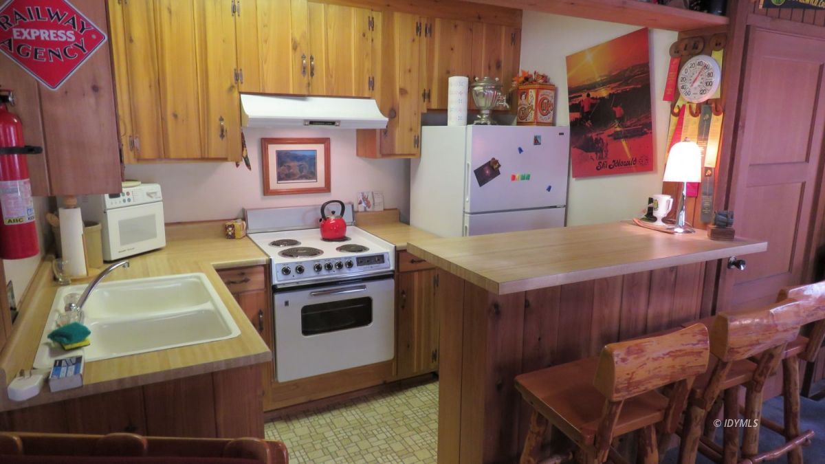 0 Lodge Road Idyllwild, CA 92549 - Photo 6 of 14 a kitchen with a stove and a refrigerator