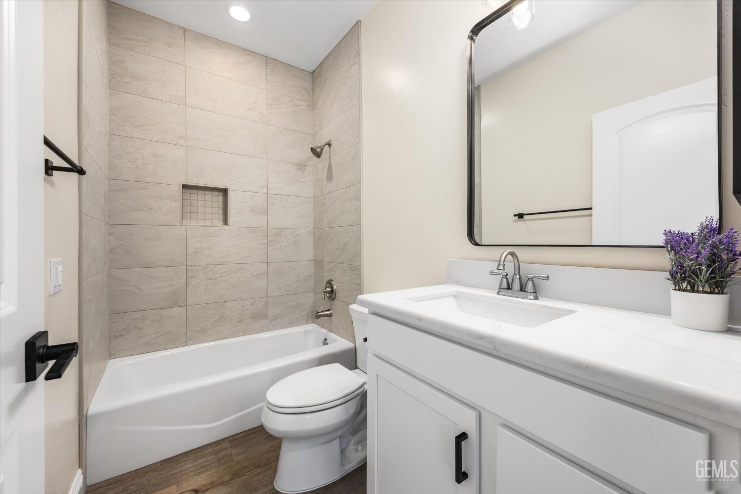 Undisclosed Address Tehachapi, CA 93561 - Photo 30 of 50 a bathroom with a bathtub shower sink vanity mirror and toilet