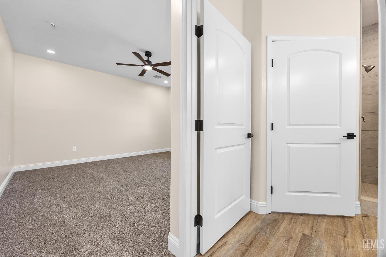 Undisclosed Address Tehachapi, CA 93561 - Photo 31 of 50 wooden floor in an empty room and a window
