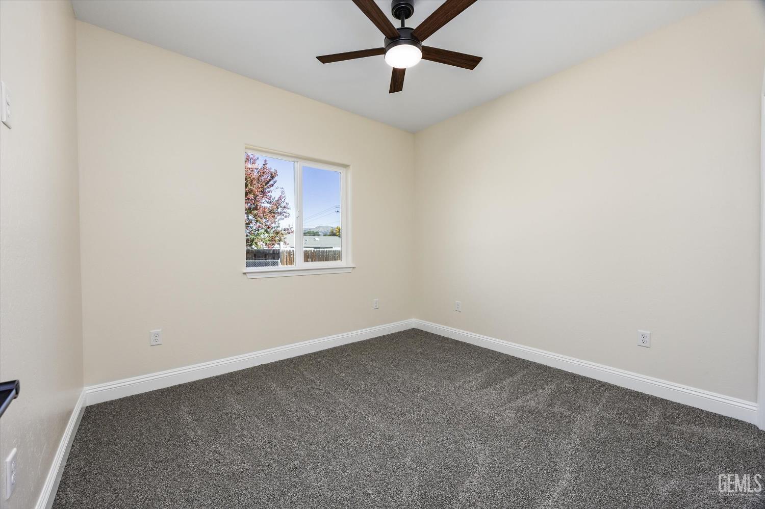 Undisclosed Address Tehachapi, CA 93561 - Photo 43 of 50 an empty room with a window and a fan