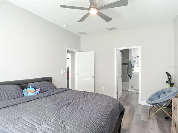 a bathroom with a granite countertop sink mirror and double