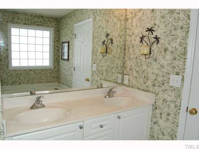 2300 Laurel Valley Way Raleigh, NC 27604 - Photo 10 of 11 Master bath features a large modern bath area w/dual vanities, tub and separate shower.