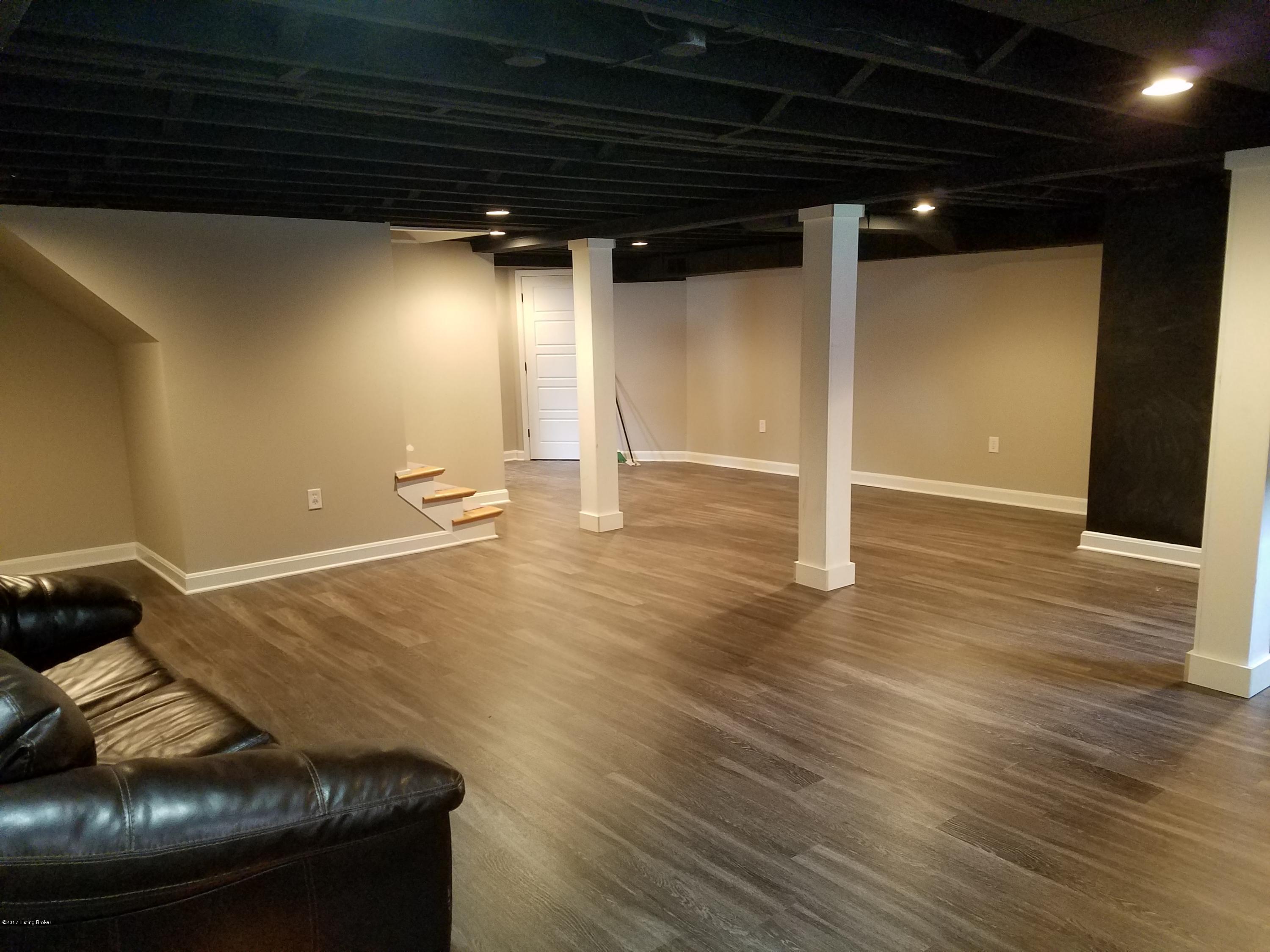 316 Sage Road Louisville, KY 40207 - Photo 17 of 28 Leather couch can stay in this fun play space with a chalkboard wall.