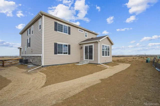 a view of a house with a patio