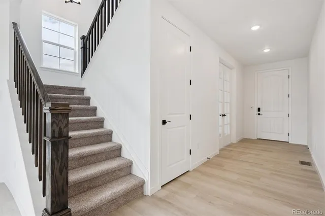 a view of an entryway with staircase