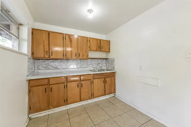a view of cabinets and window