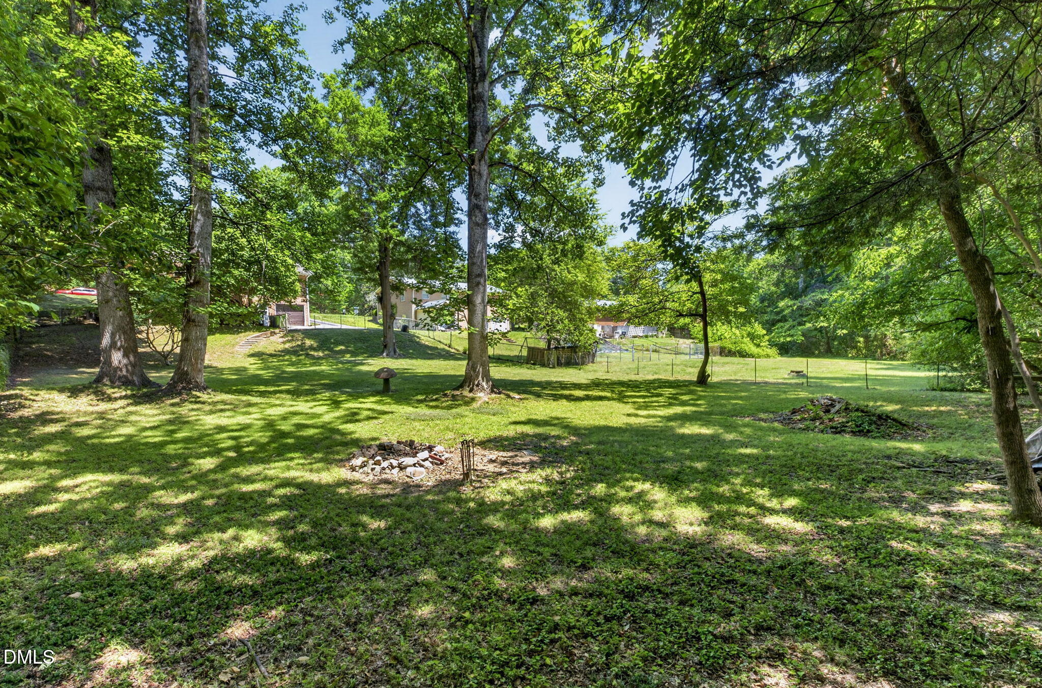 1224 Pineview Drive Raleigh, NC 27606 - Photo 42 of 45 a view of a green field with trees