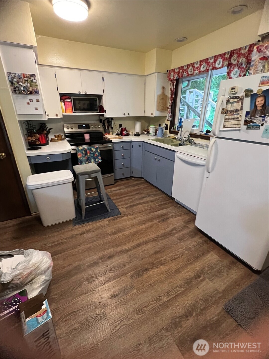452 Lincoln Creek Road Centralia, WA 98531 - Photo 12 of 25 a kitchen with stainless steel appliances a stove top oven a sink dishwasher and a microwave