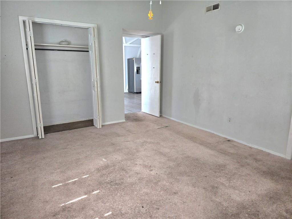 4701 Flat Shoals Road, Unit 67D Union City, GA 30291 - Photo 8 of 13 a view of a big room with closet and cabinet