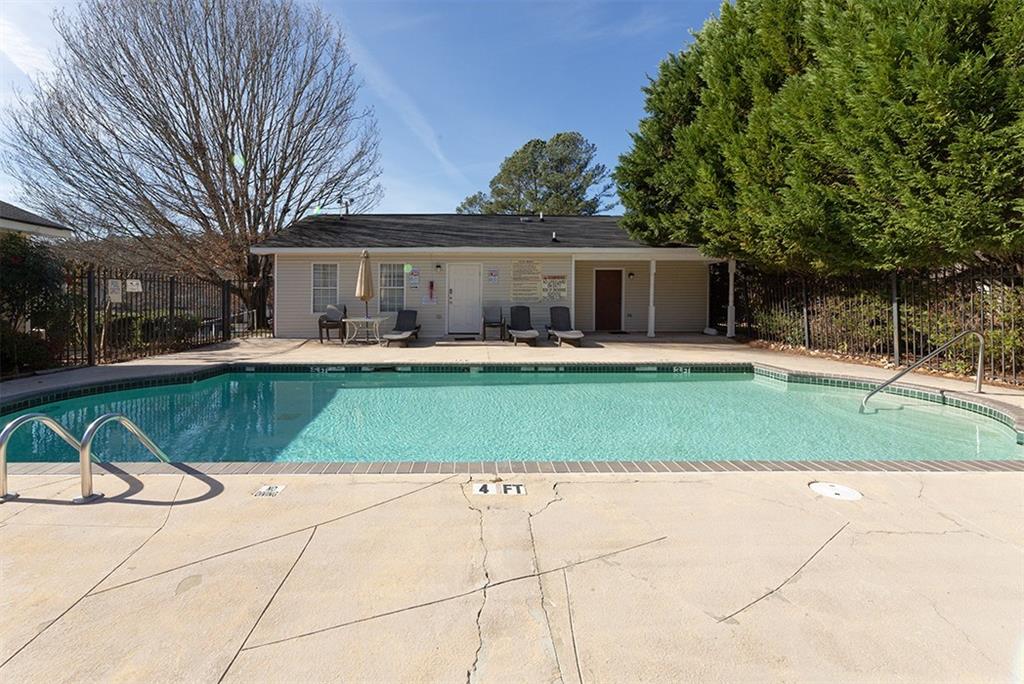 5058 Jonesboro Road, Unit E37 Union City, GA 30291 - Photo 4 of 4 a house view with a outdoor space