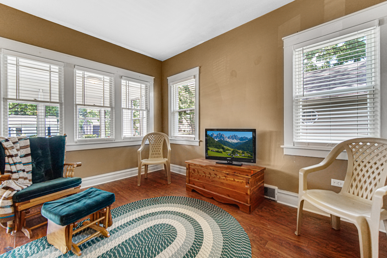 520 North Reed Street Joliet, IL 60435 - Photo 12 of 23 a living room with furniture and a flat screen tv