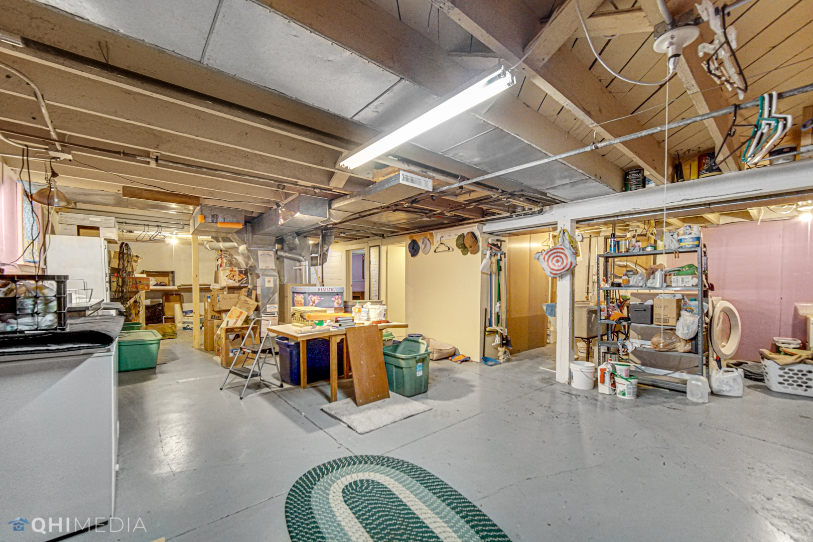 520 North Reed Street Joliet, IL 60435 - Photo 14 of 23 a view of a room with lots of furniture and clutter