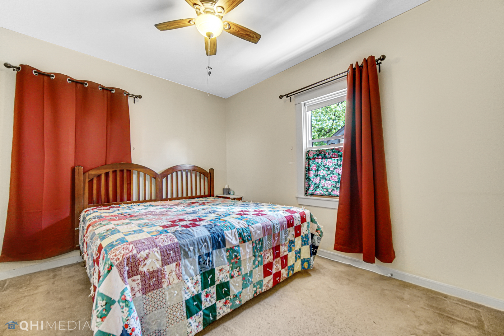 520 North Reed Street Joliet, IL 60435 - Photo 15 of 23 a bedroom with a bed and a window